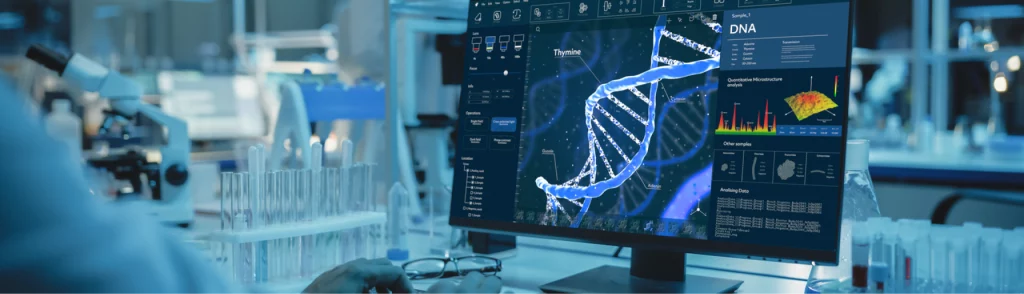 En un laboratorio clínico, un especialista en medicina de precisión analiza datos genéticos utilizando software avanzado desde una computadora de escritorio.